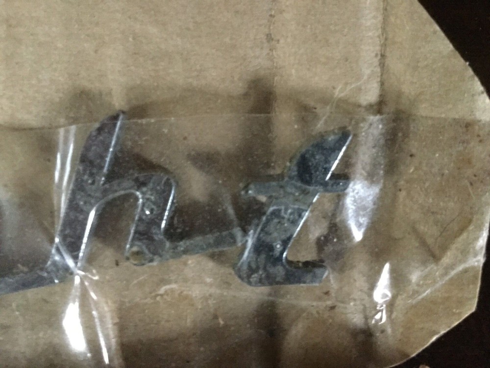 1953 1954 Dodge V Eight Trunk Badge pair one solid one pieces complete