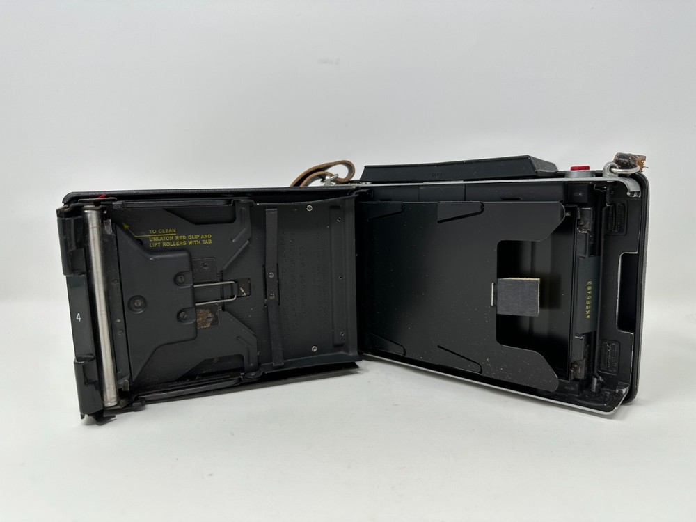 Polaroid Folding Land Camera Vintage Automatic 100 with strap booklets UNTESTED