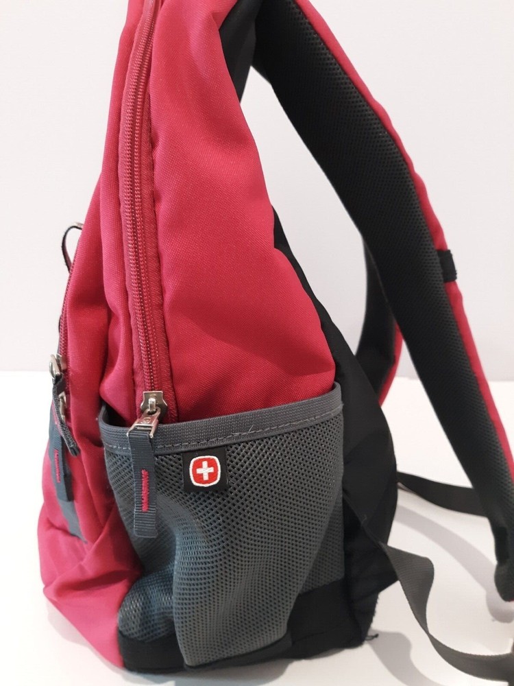 Red backpack made in Switzerland