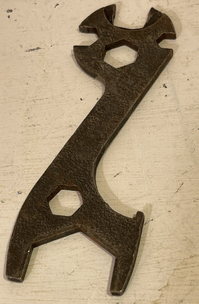 A vintage British mullti-use bicycle spanner