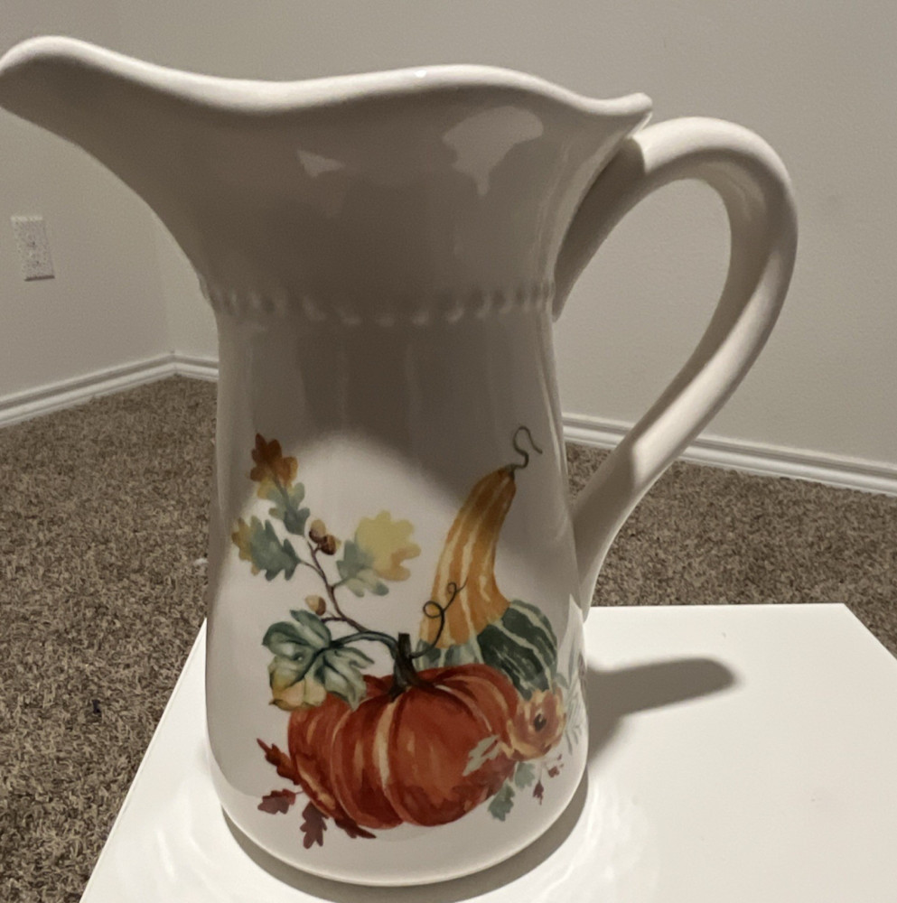 Ceramic White Pitcher with Pumpkin Design,