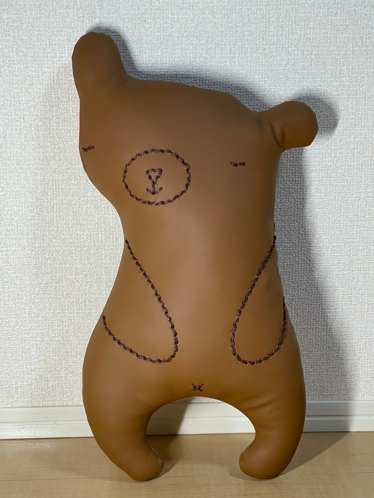 Handcrafted leather teddy bear that can chat in several languages