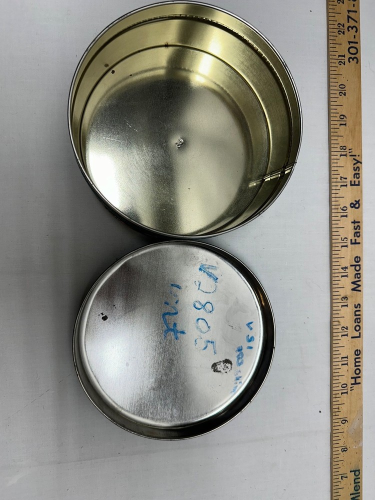 D. E. Wolfgang Candy Tin - 6 inch round