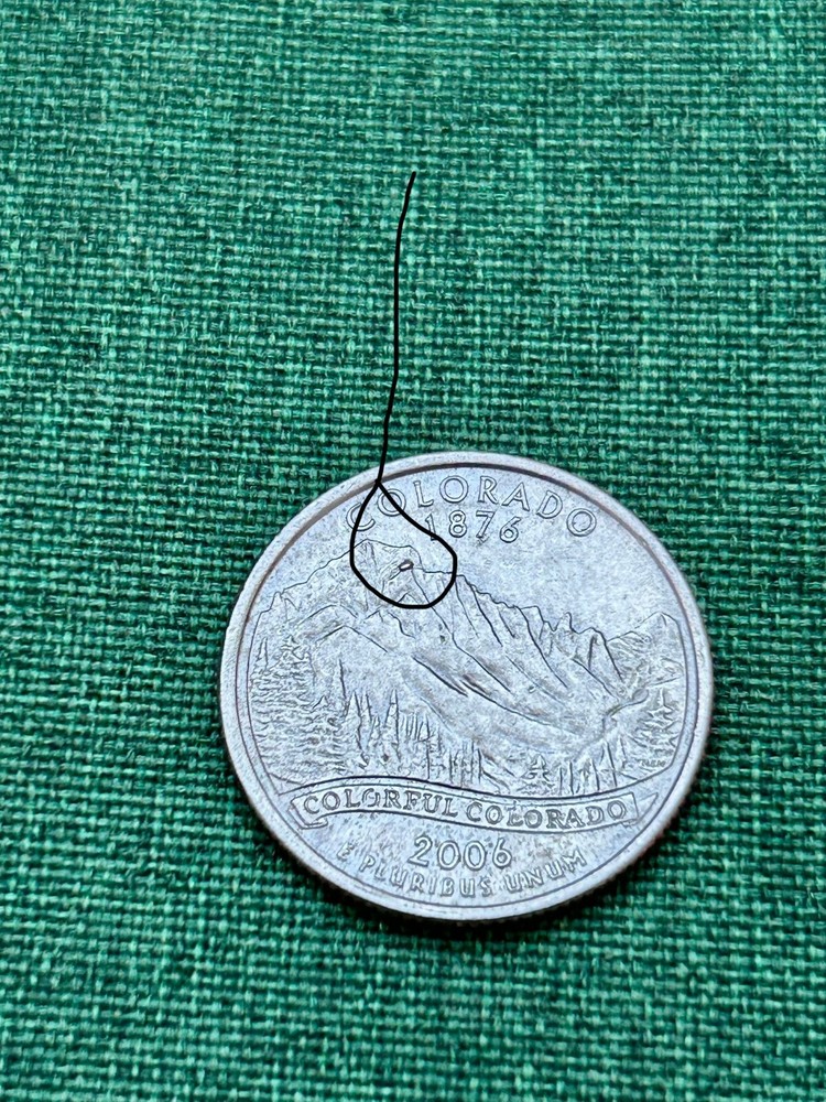 2006 P Colorado State Quarter Mint error.on reverse extra boulder on mountaintop