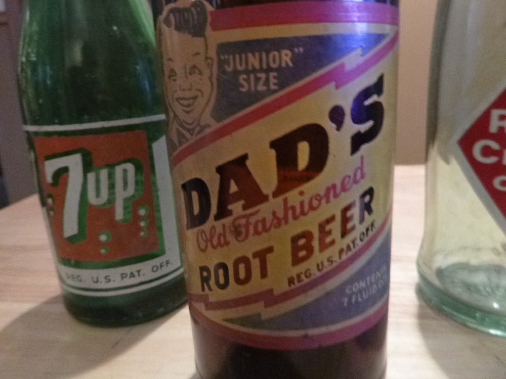 FIVE NICE VINTAGE POP BOTTLES