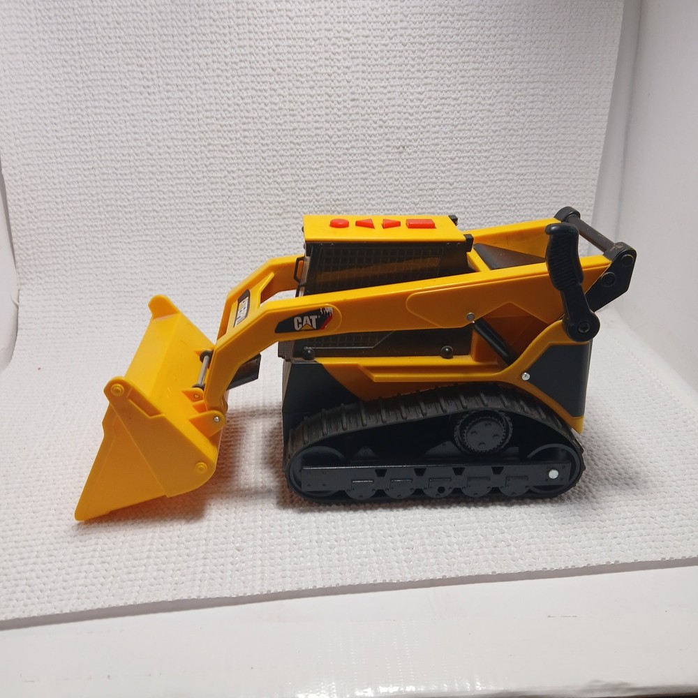 Caterpillar (CAT) toy skid steer loader, likely a "Big Builder". UNTESTED