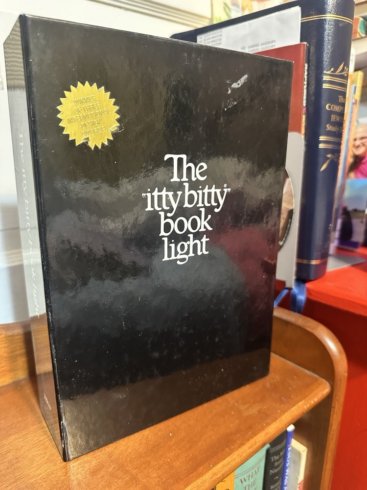 1980’s Original, The "itty bitty book light". Before LED lights