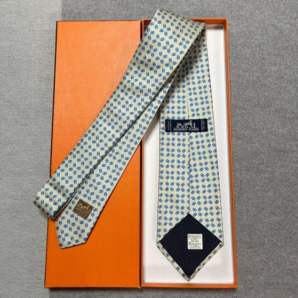 HERMES tie blue and white H pattern silk jacquard