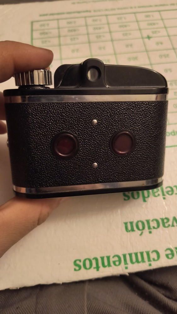 vintage becon camera with leather case
