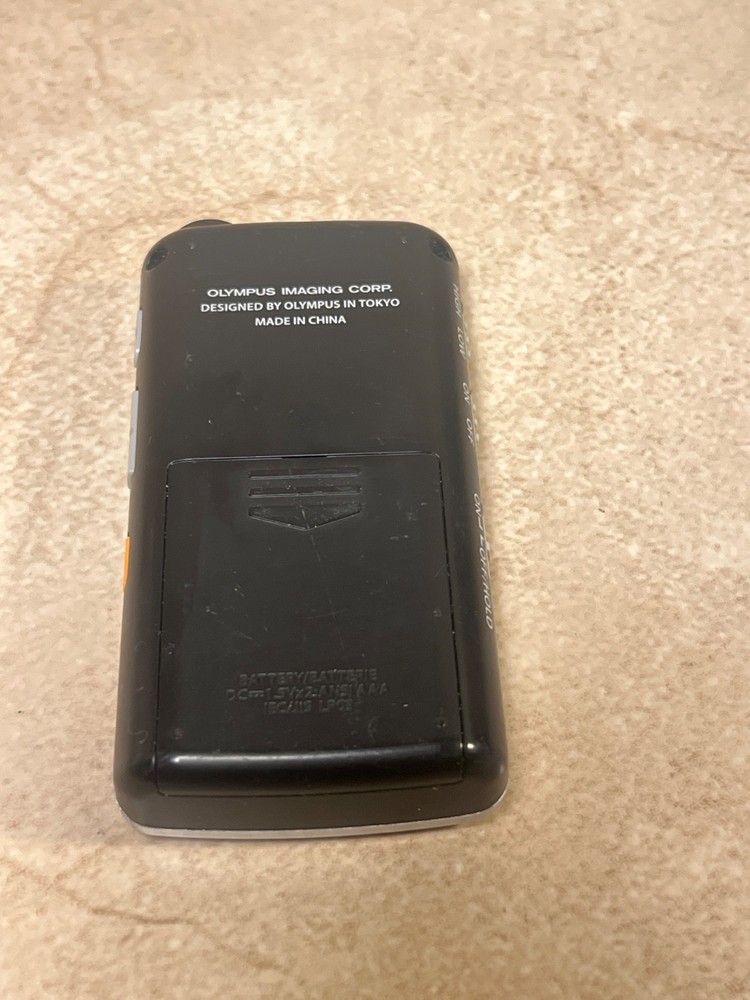 Olympus DP-201 digital voice recorder.