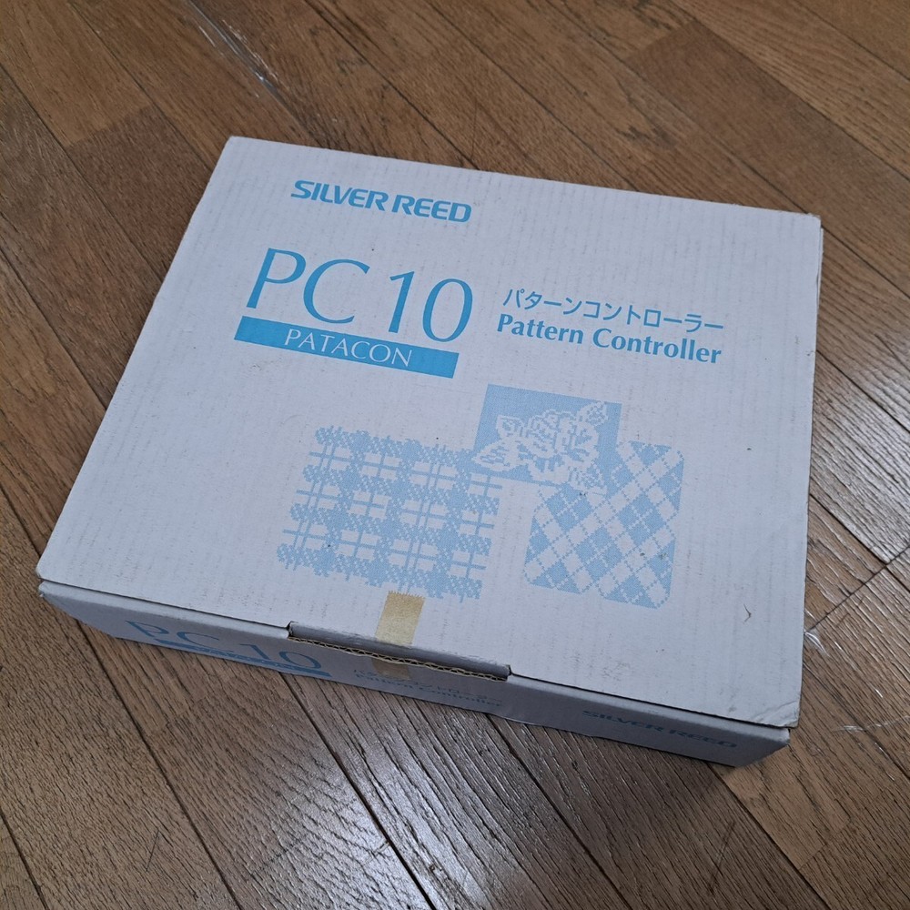 Unused silver electronic knitting machine, pattern controller PC10, working fine