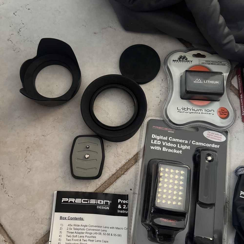 New and used camera accessories lot
