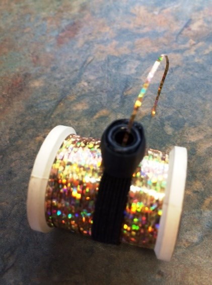 1 FLY TYING SPOOL HAND. keep your tinsel, floss or material from unspooling.