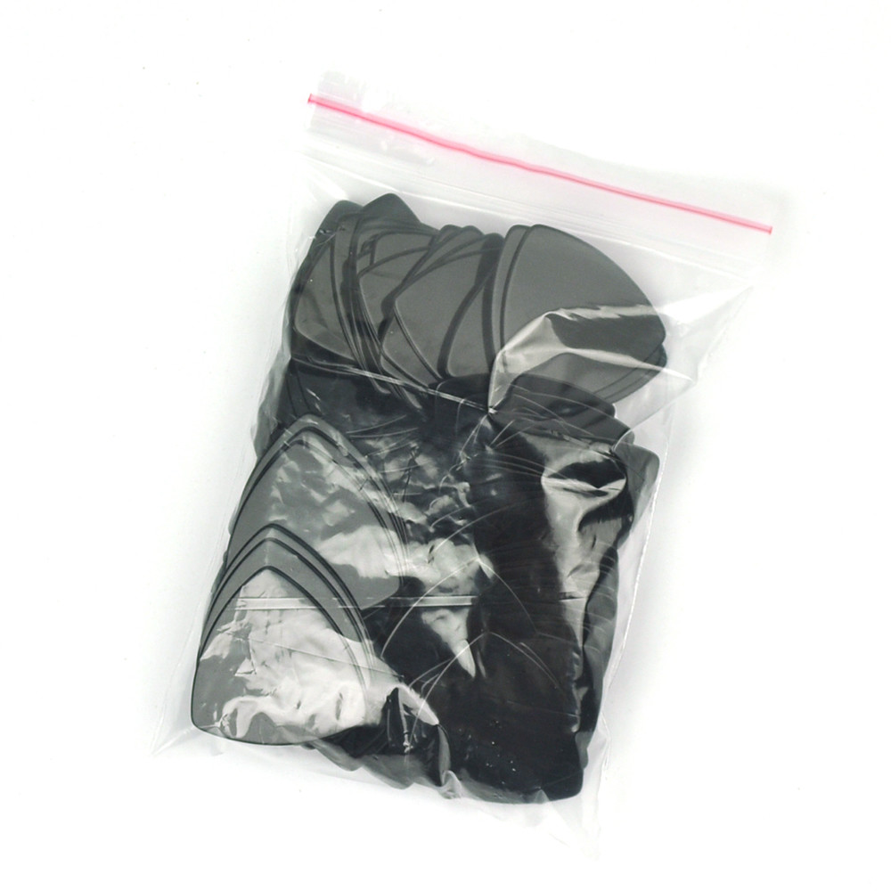 Lots of 100 pcs Solid Black Triangle Medium 0.71mm Celluloid Guitar Picks