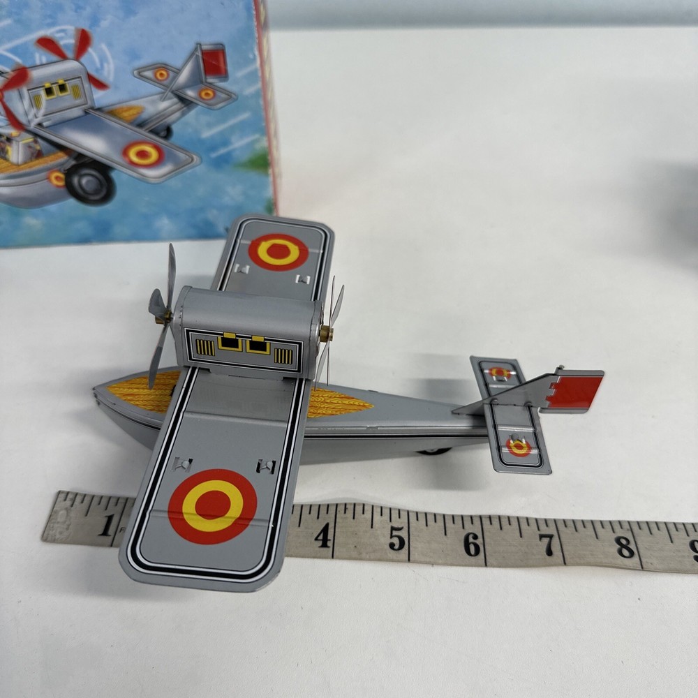 Supt Propeller Plane (We could not get this to work) Small Tin plane