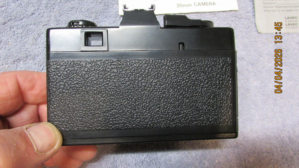 3 vintage cameras.