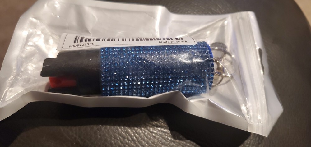 Self defense key chain with pepper spray