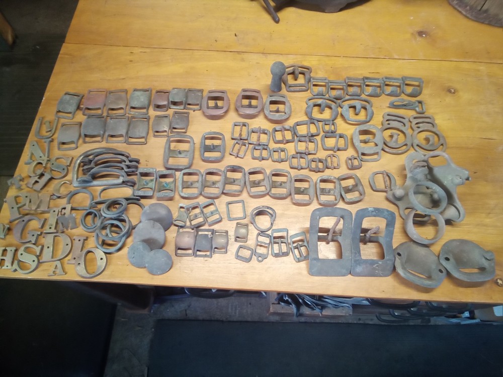 large assortment brass harness buckles
