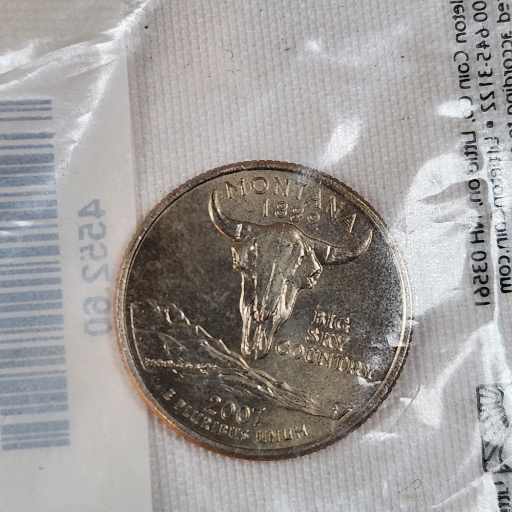 Six Uncirculated State Quarters. See Description