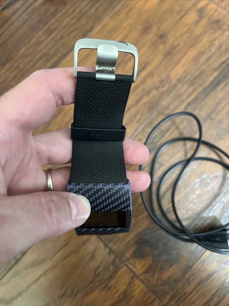 Fitbit Surge Wristband Activity Tracker Doesn’t Hold A Charge. With Charger