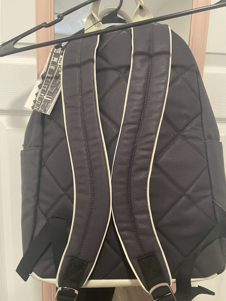 Penfold Heritage Backpack" and "USGA 1894 Shield"