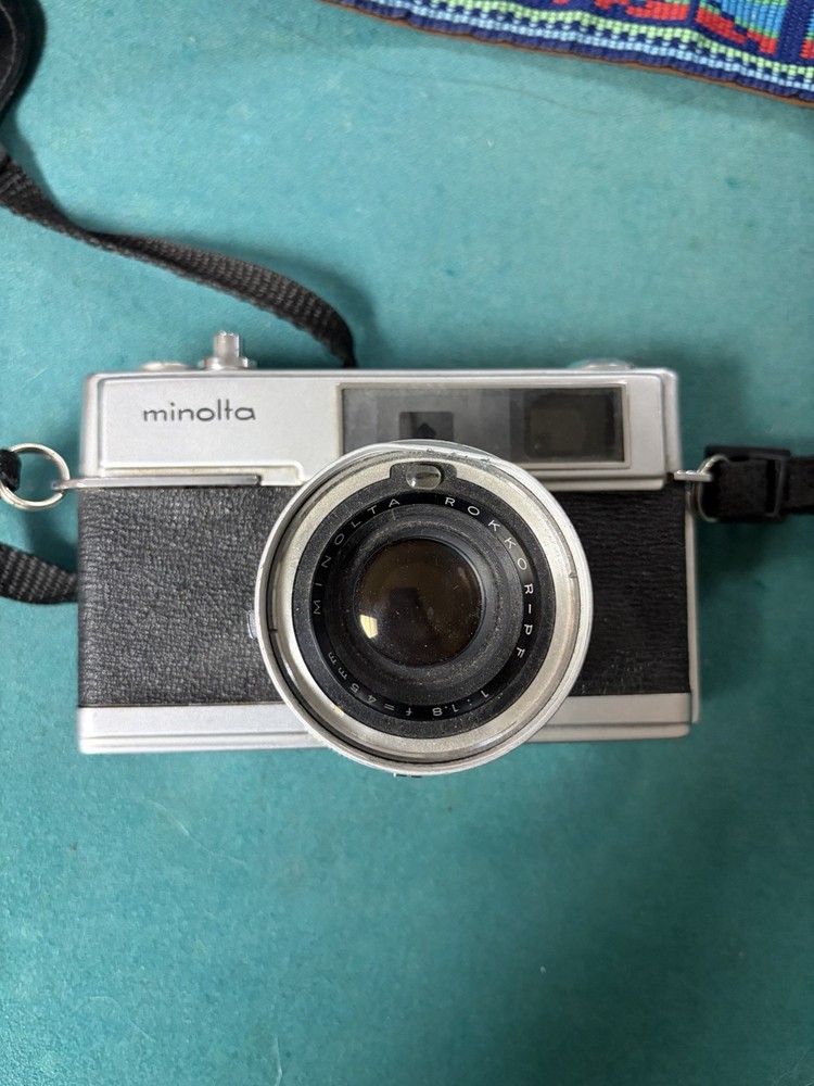 Minolta Hi-Matic 7 Black Silver Rangefinder Camera with Aztec Strap UNTESTED