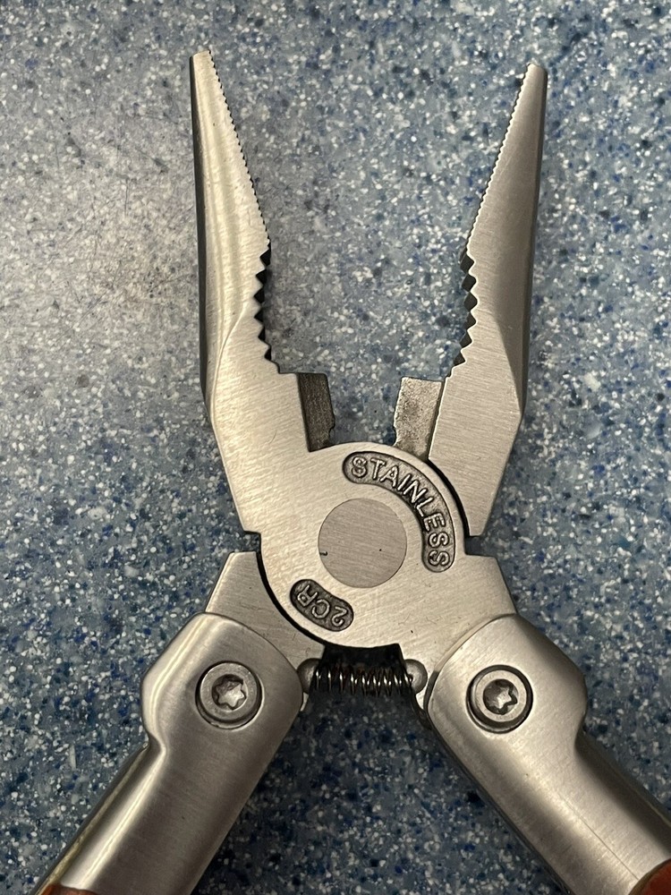 Elk Ridge-Multi Tool With Assorted Tools -pliers -knife-sockets- Bottle Opener