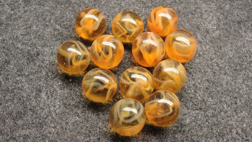 1  dozen Mint Champion  marbles   m28c