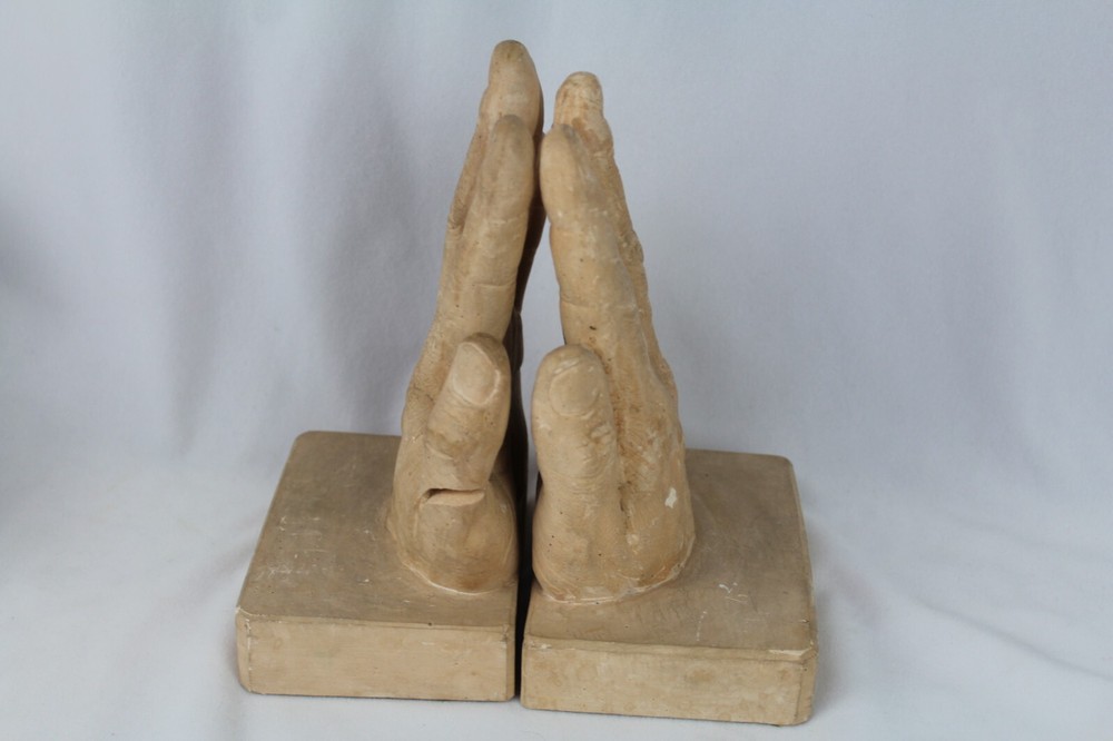 Plaster bookends Reading Hands