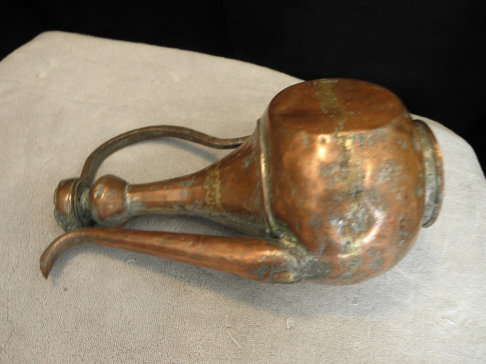 Vintage or antique copper jug