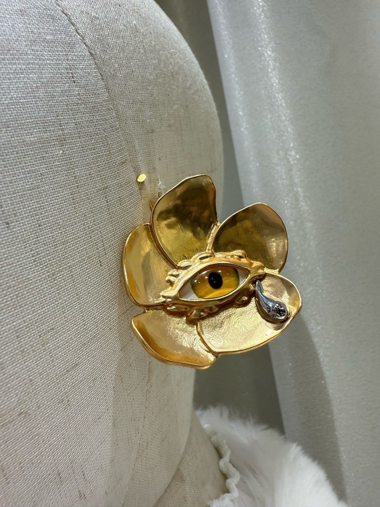 Schiaparelli flower yellow eye earring