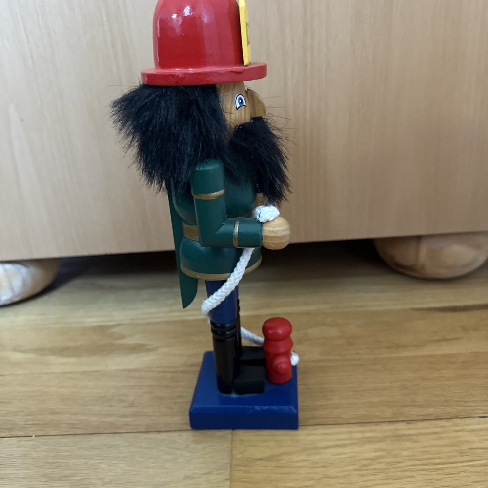 Fireman Nutcracker 10" Tall with Fire Hydrant and Fire Hose