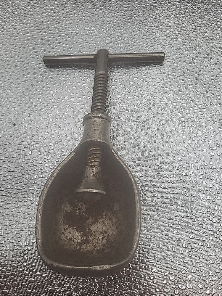 Vintage nut cracker Cast Iron T Handle Screw Shell Design