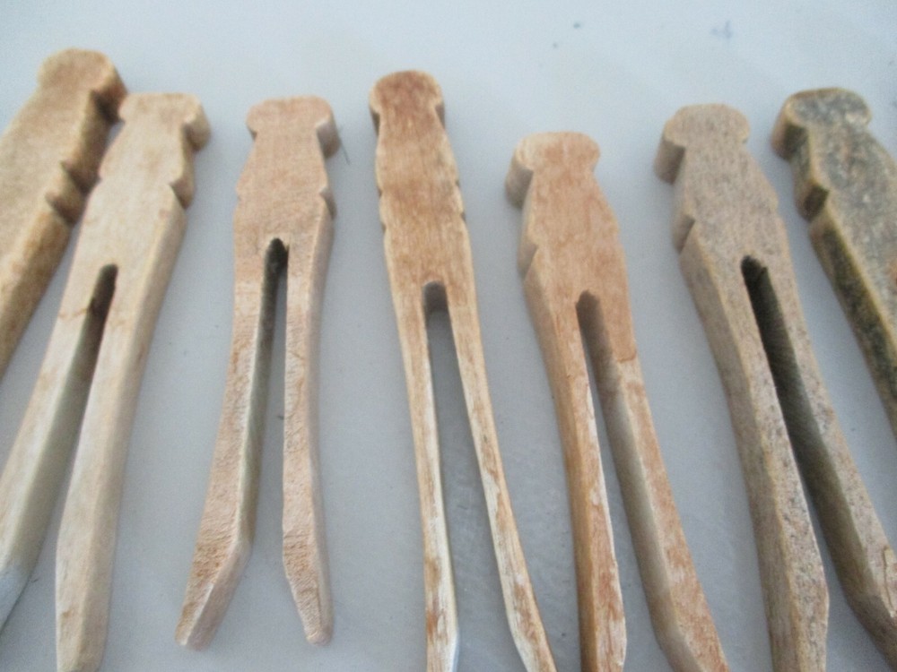 Antique Primitive wood clothes pins. Knobs on top.Two different styles. 46 total