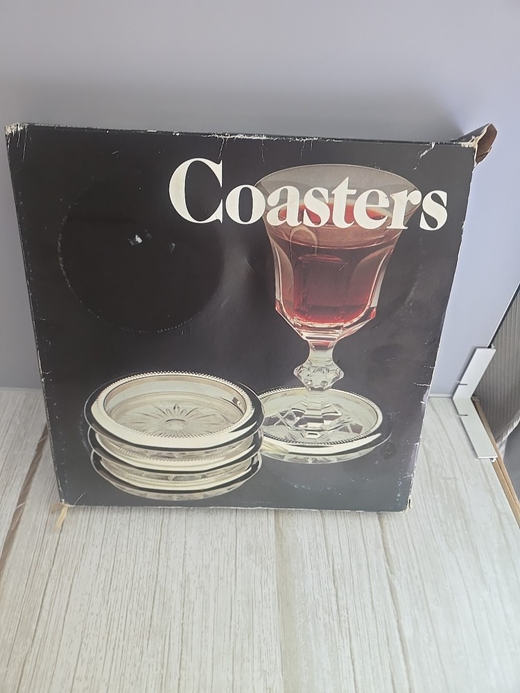 4pc Coaster set Leonard Silver MFG 1980 Coasters still in plastic