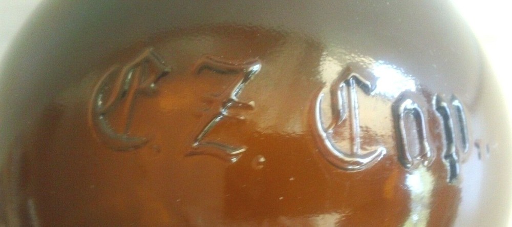 One E-Z Cap Amber 16 Ounce Bottle with Embossed Pattern on Side