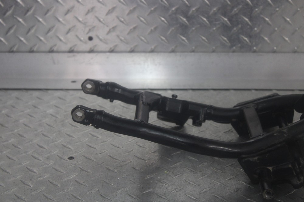 2004 SUZUKI GZ250 LOWER FRAME RAIL FOOTPEG BRACKET MOUNT
