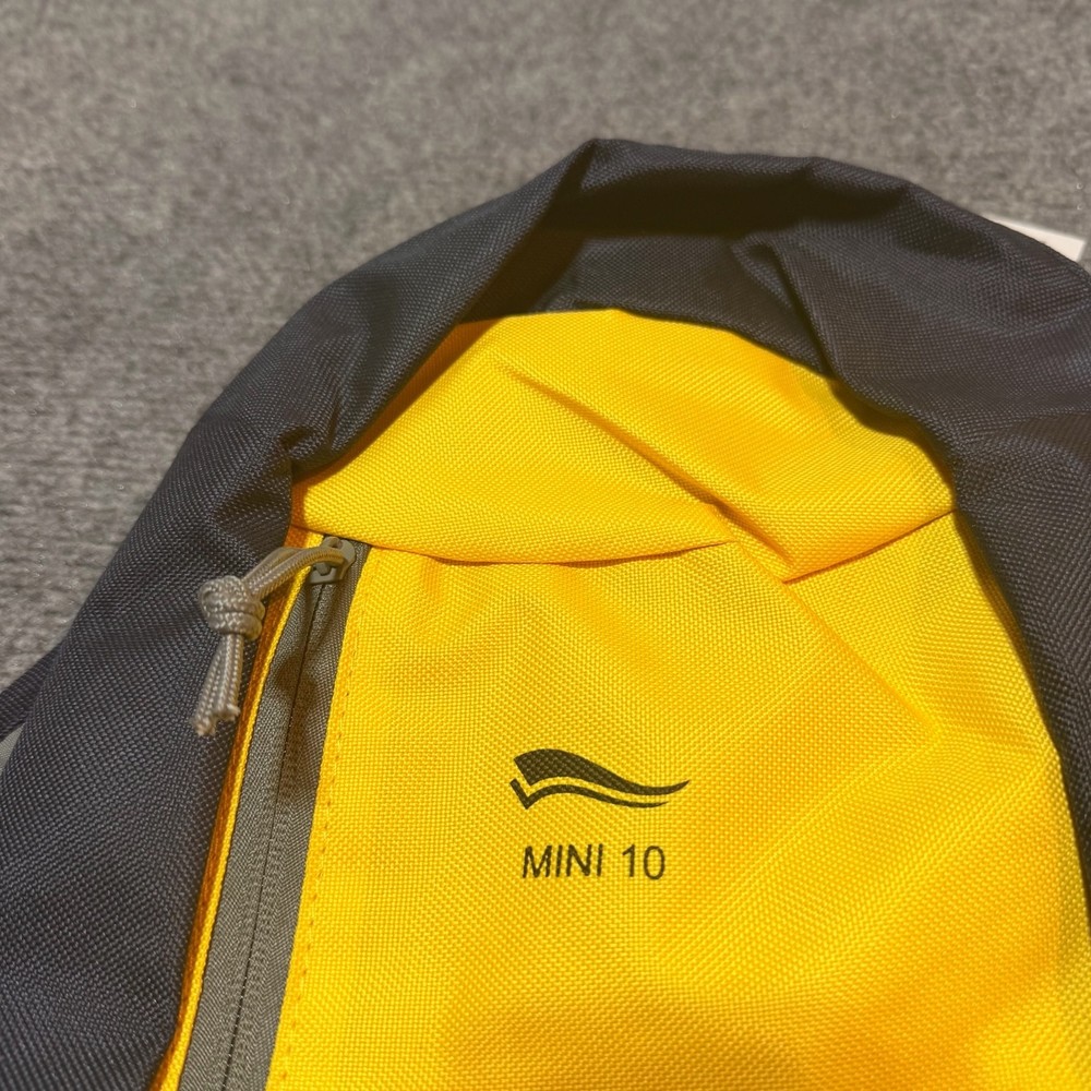 NEW Crivit Mini Backpack Black Yellow Bag Padded Panel Adjustable Shoulder Strap