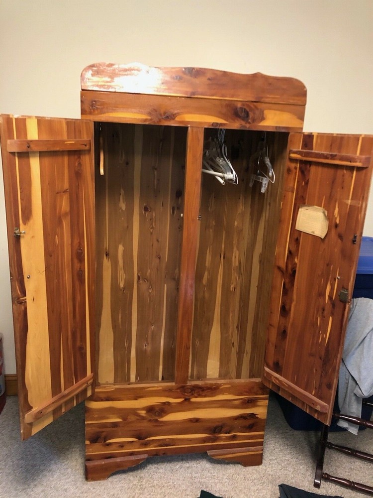 cedar wardrobe with hanging bar, 2 latching doors, good condition