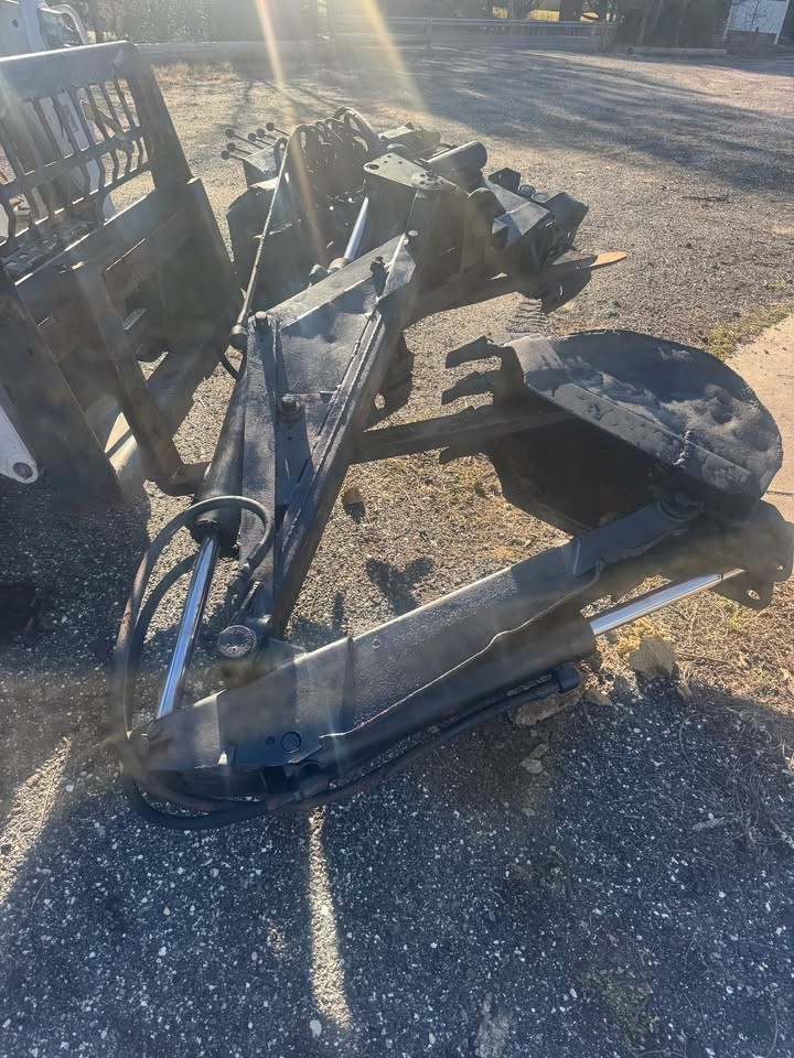 Heavy-duty white backhoe-used good shape