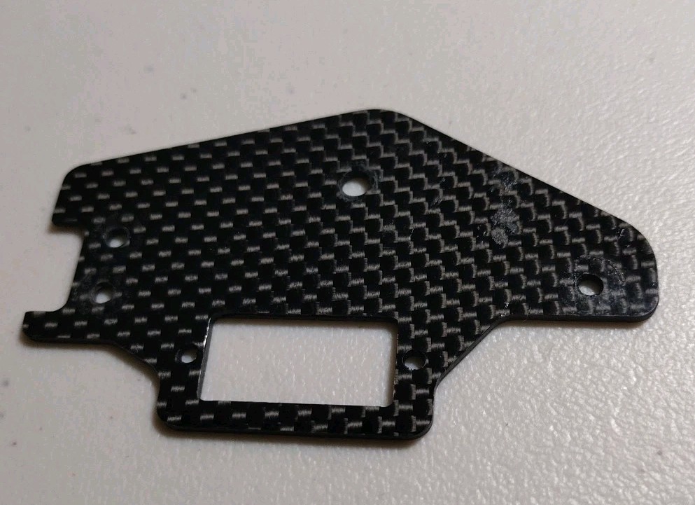 Trex 600 CF Switch Plate & Front Frame Brace - 50NB071A