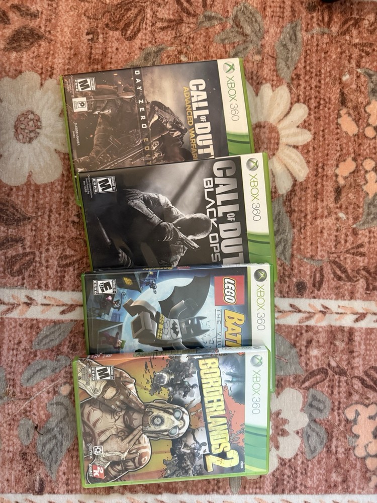 Xbox 360- Includes 4 Games 3 Controllers