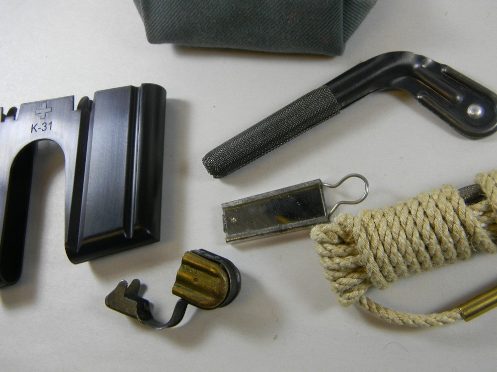 SWISS ARMY ISSUE K-31 CLEANING SET WITH POLYMER LOADING CLIP AND MUZZLE COVER