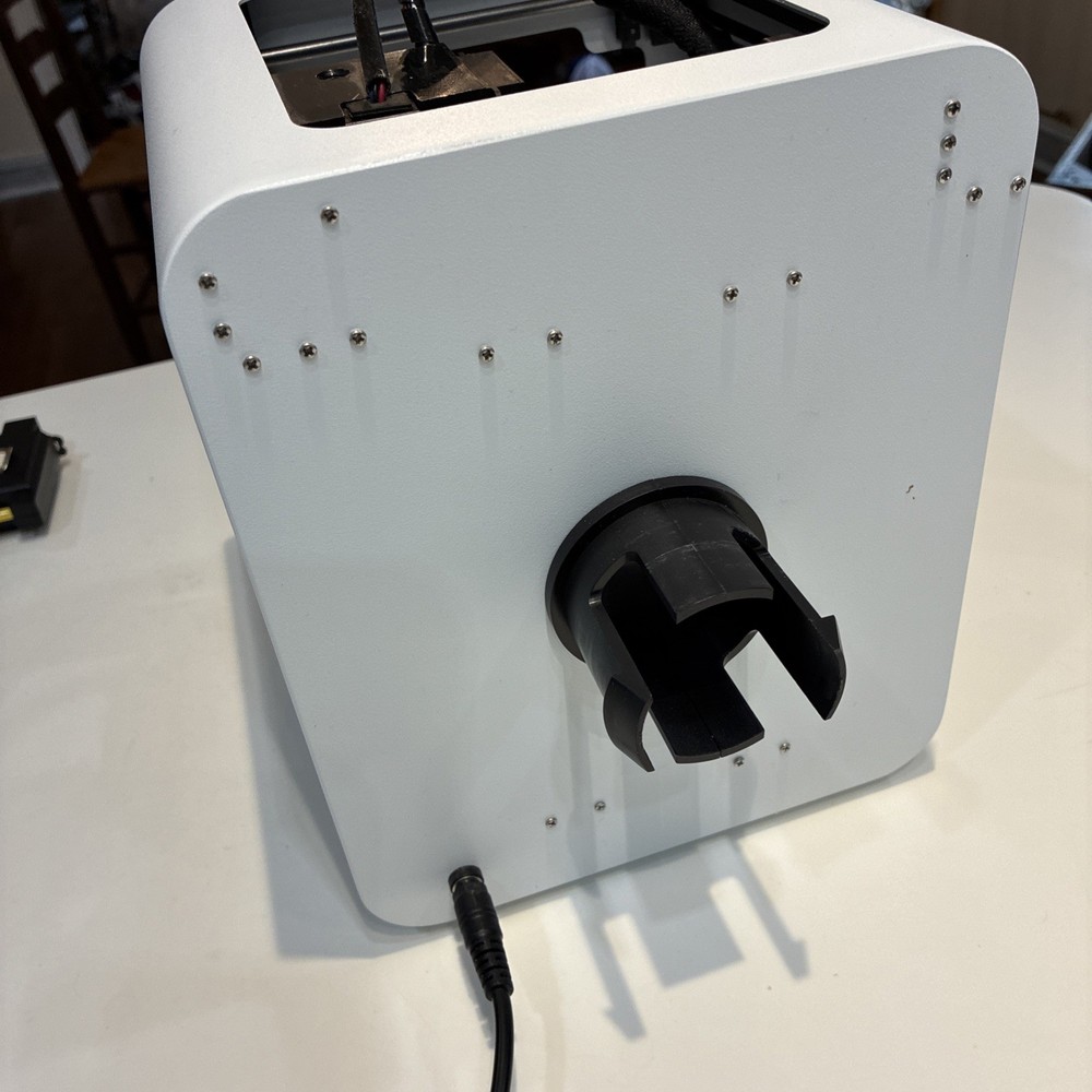 TOYBOX 3D Printer with white printer food.