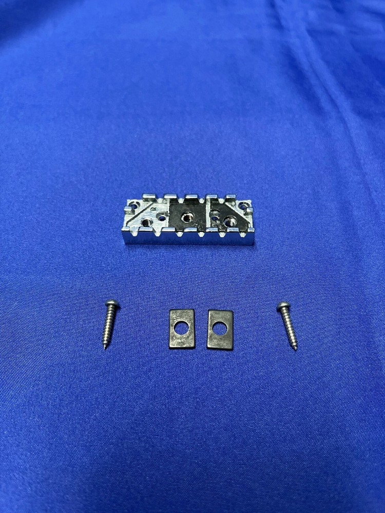 Locking Nut Wide Silver Base for an Electric Guitar