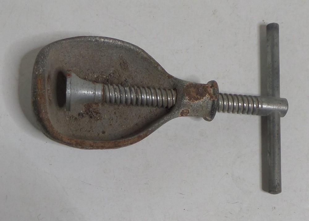 cast iron nut cracker vintage