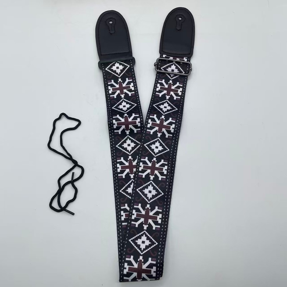 Black checkered pattern guitar strap, highly functional, currently on sale