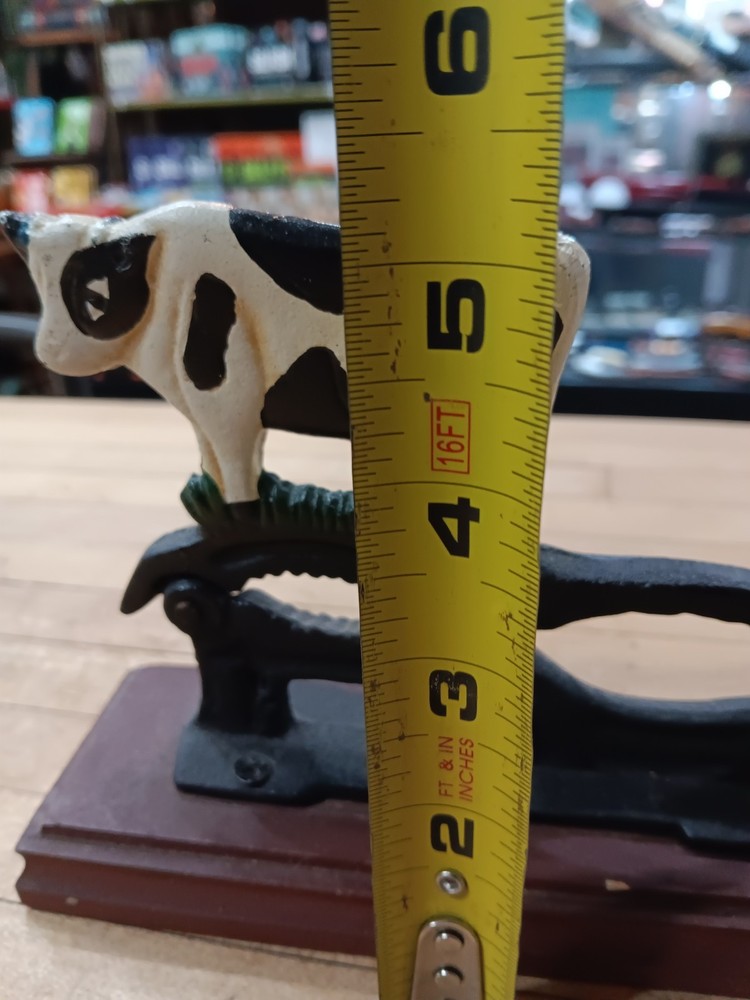 Vintage Cast Iron Cow Nutcracker on Wooden Base