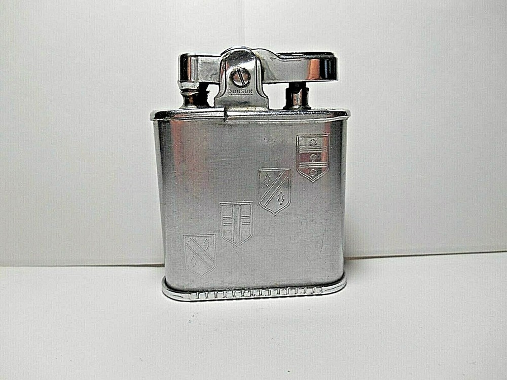 Vintage Ronson WHIRLWIND CHROME CIGARETTE LIGHTER. ETCHED 14TH CENTURY SHIELDS