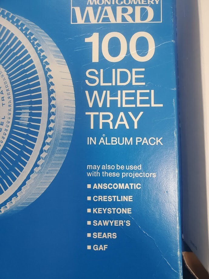 Two 1960's Montgomery Ward 100 Slide Wheel Trays 67-3473